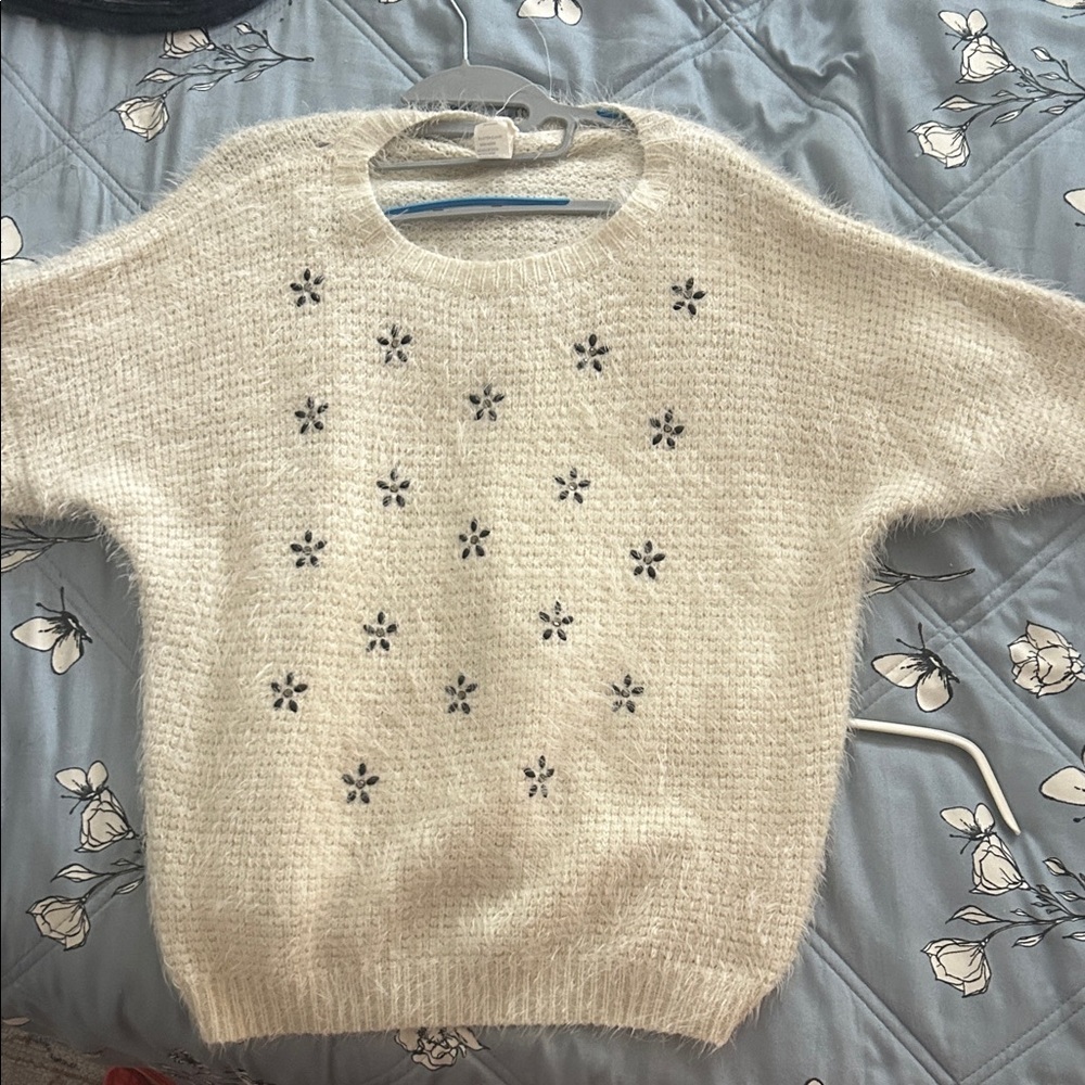 Elegant Cream Sweater with Snowflake  Details
